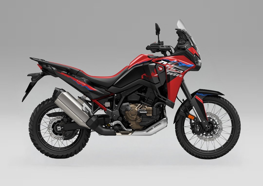 Honda Africa Twin 2026, moto adventure blanco rojo azul, vista lateral